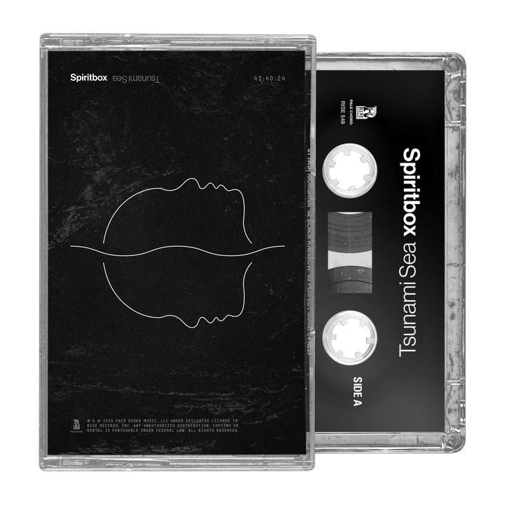 A Spiritbox Tsunami Sea cassette tape with case. The black cover shows a minimalist white line drawing of two overlapping face profiles; the cassette displays the title and Spiritbox brand name in white text.