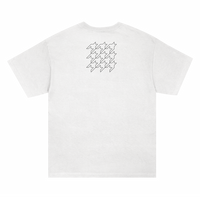 SIIICKBRAIN white short-sleeve Comfort Colors t-shirt shown from the back, featuring a black outlined houndstooth graphic in the upper right. Printed garments ship 4/3/26.