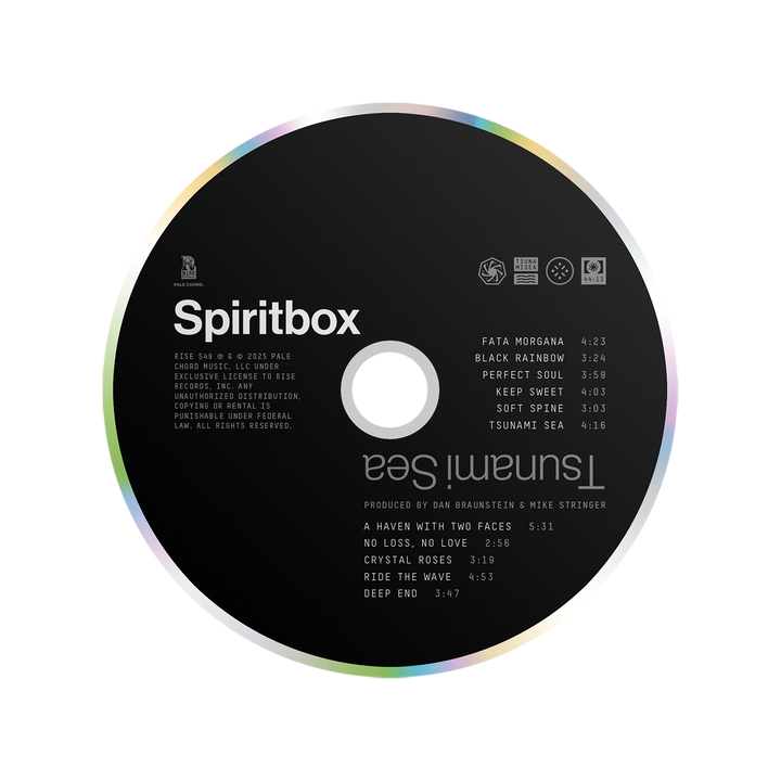 A Spiritbox CD titled “Tsunami Sea” displays the album and track list in white on black, highlighted by an iridescent edge. Copyright and production credits are also present.