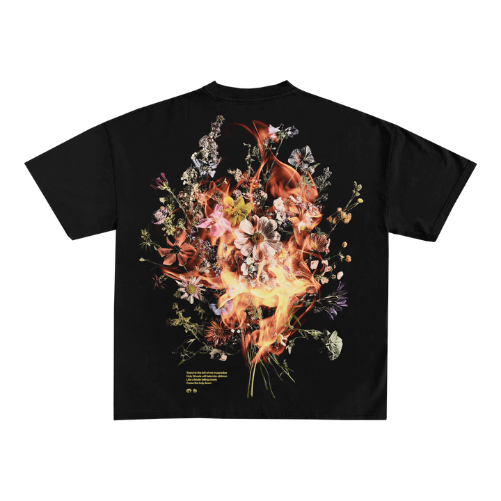 Spiritbox Black T-Shirt featuring a vibrant Burning Floral graphic on the back—assorted flowers with realistic orange flames and small white and yellow text accents near the bottom.