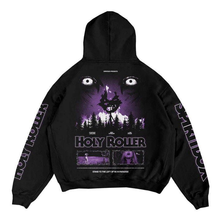 Spiritbox black ring-spun cotton hoodie with purple and white eerie eye, forest, and HOLY ROLLER graphics on the back; SPIRITBOX text along the sleeves. Finished in a horror movie poster style with a fleece-lined hood.
