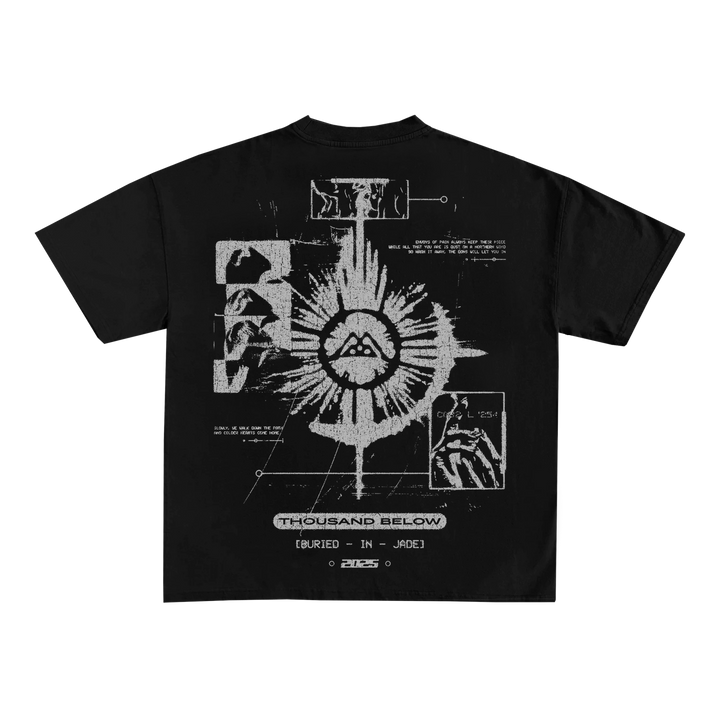 Thousand Below black t-shirt with abstract white graphics—geometric shapes, lines, a central emblem, small images, and “THOUSAND BELOW (BURIED IN – JUNE) 2023” at the bottom. High-quality ShakaWear. Presale item.