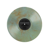 A translucent marbled vinyl by Holy Wars with green and orange swirls, titled Shadow Work/Light Work LP. Features track list and album info clearly printed on the black center label.