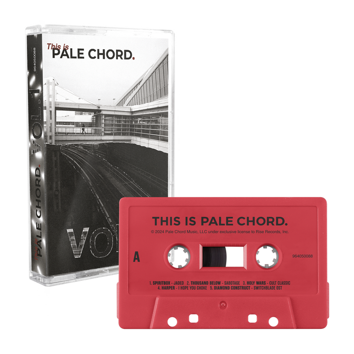 A red cassette labeled This Is Pale Chord from Pale Chord Music sits before its case, which displays a modern black-and-white building, the title, part of the tracklist, and names like Spiritbox and Thousand Below.