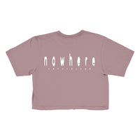 A mauve cropped t-shirt from Saphir Levi, featuring nowhere recordings in a distorted, stretched white font on the back.