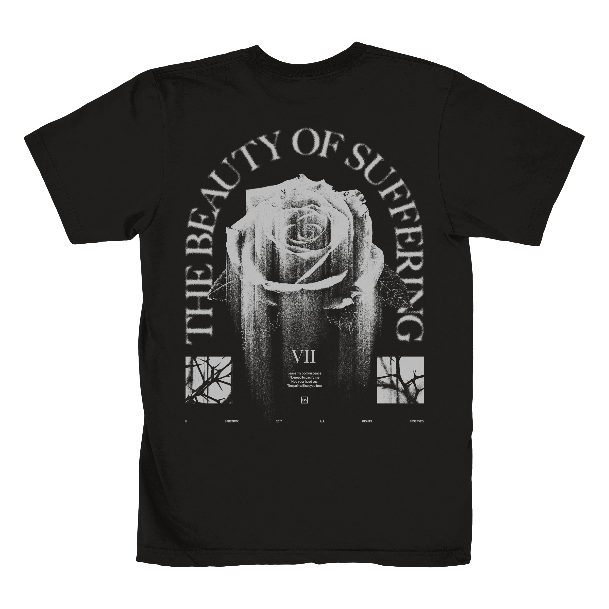 Black t-shirt by Spiritbox, made from 100% combed ring-spun cotton. Features a large white rose, “THE BEAUTY OF SUFFERING” text, three images beneath the rose, and Roman numeral VII. Fabric-laundered for softness.