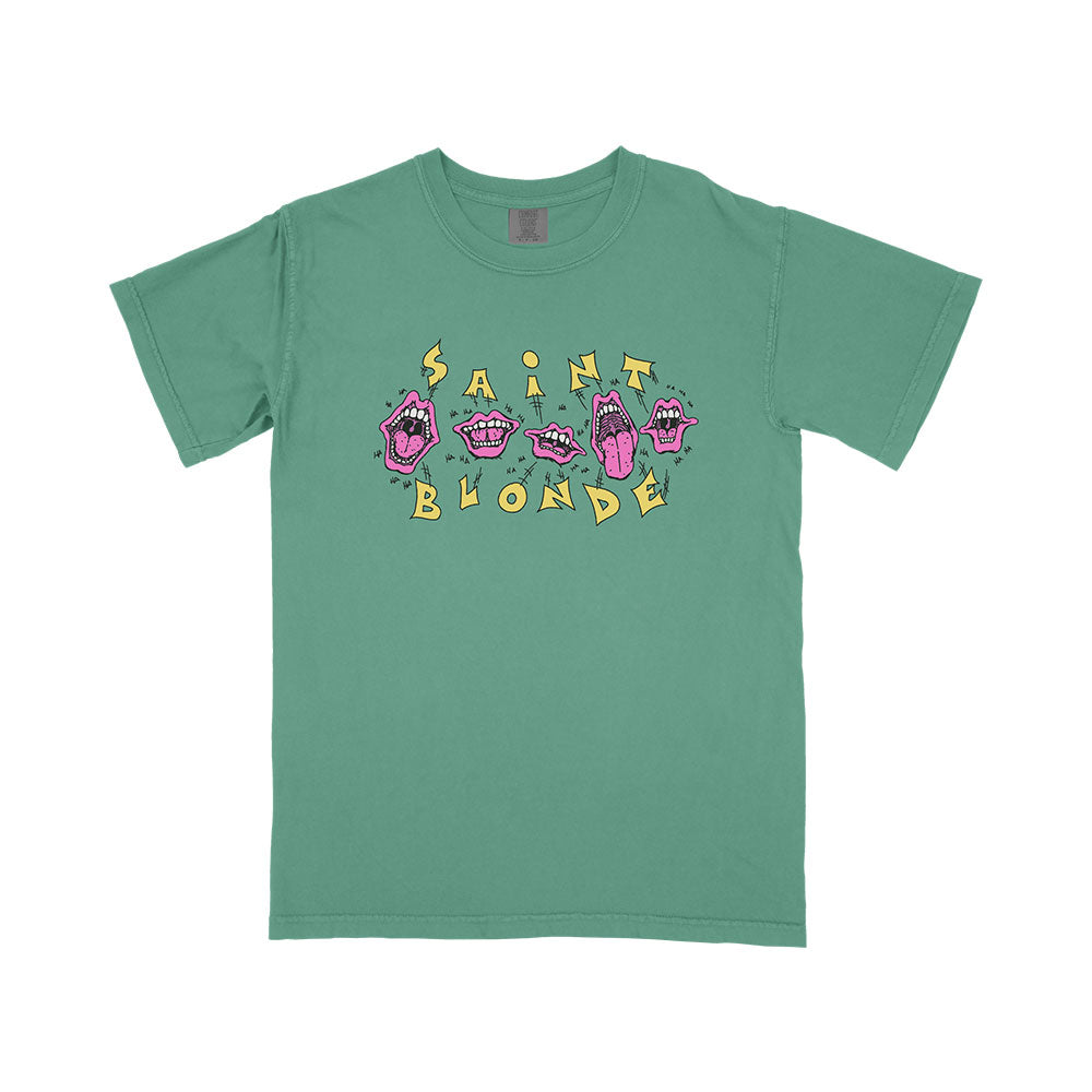 Saint Blonde green Comfort Colors t-shirt with cartoon pink mouths and hands, plus bold yellow "SAINT BLONDE" letters on front. Available now as a presale printed garment!.