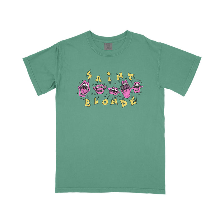 Saint Blonde green Comfort Colors t-shirt with cartoon pink mouths and hands, plus bold yellow "SAINT BLONDE" letters on front. Available now as a presale printed garment!.