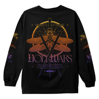 A black long-sleeve Comfort Colors shirt by Holy Wars with vibrant dragonflies, a large hourglass, Roman numerals, "HOLIDAYS" in stylized text on the back, plus small text and decorative lines for added detail.