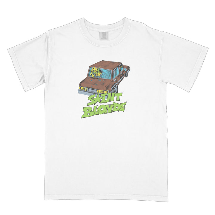 Saint Blonde white t-shirt made from Comfort Colors, showcasing a brown car with a broken rear window and "SAINT BLONDE" in bold light green text beneath the illustration.