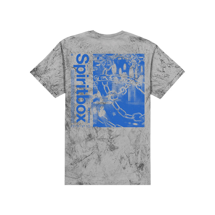 A gray marbled Spiritbox Colorblast Smoke T-Shirt features a large blue graphic with chains and abstract shapes on the back, and "Spiritbox" printed vertically along the left side.