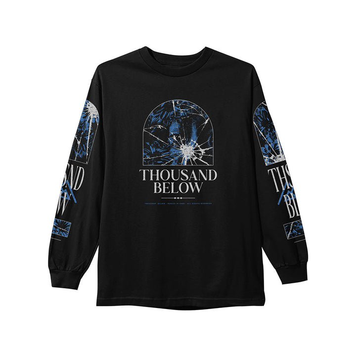 Black long sleeve shirt by Thousand Below featuring blue and white cracked glass designs, "THOUSAND BELOW" text on chest, Buried In Jade accents, and matching graphics on both sleeves.
