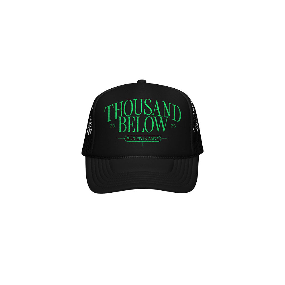 A black mesh band cap with Thousand Below 2025 in bold green text and Buried In Jade below, both centered on the front panel.