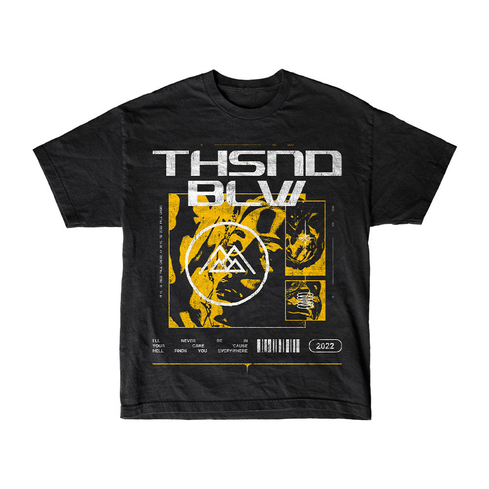 Thousand Below black T-shirt with bold white "THSND BLW" text above yellow and white abstract designs—geometric symbol, barcode, and "2022." Inspired by the band’s Hell Finds You Everywhere era.