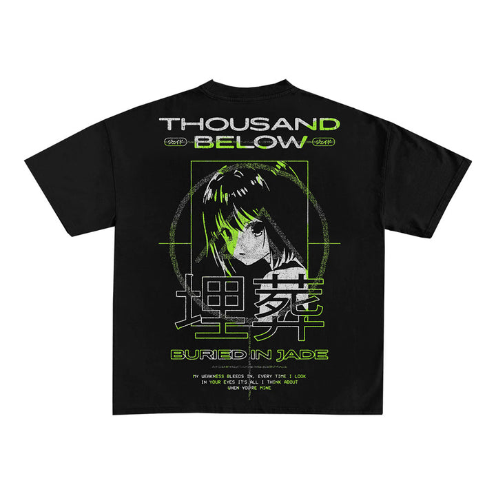 Thousand Below black anime shirt with green and white graphics of an anime-style girl’s face in a target frame, plus “THOUSAND BELOW,” “BURIED IN JADE,” and Japanese characters printed on the back.