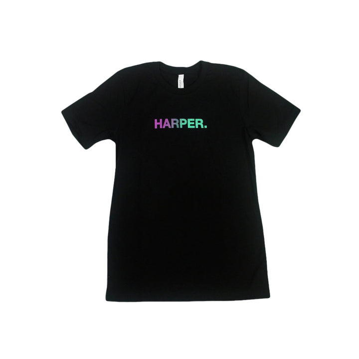 Black Harper T-shirt featuring "HARPER." in a purple-to-green gradient across the chest. Made from 100% cotton with unisex sizing, it is displayed flat on a white background for a clean, modern look.